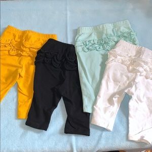 4 pack of baby 0-3 month ruffle butt pants